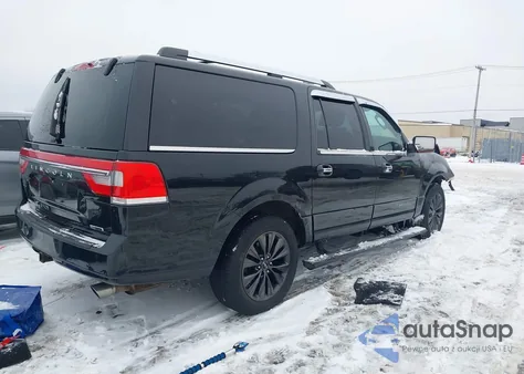 2015 Lincoln Navigator L z USA, uszkodzony, nr VIN 5LMJJ3JT7FEJ02850